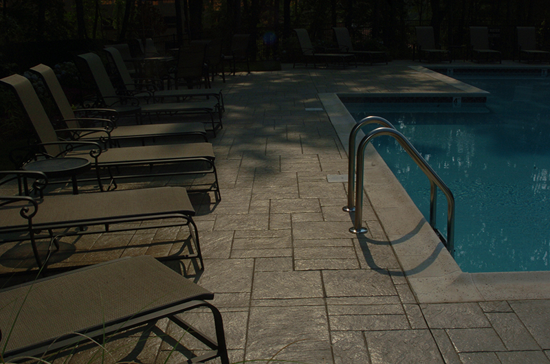 Swimming pool and stamped concrete project example 110